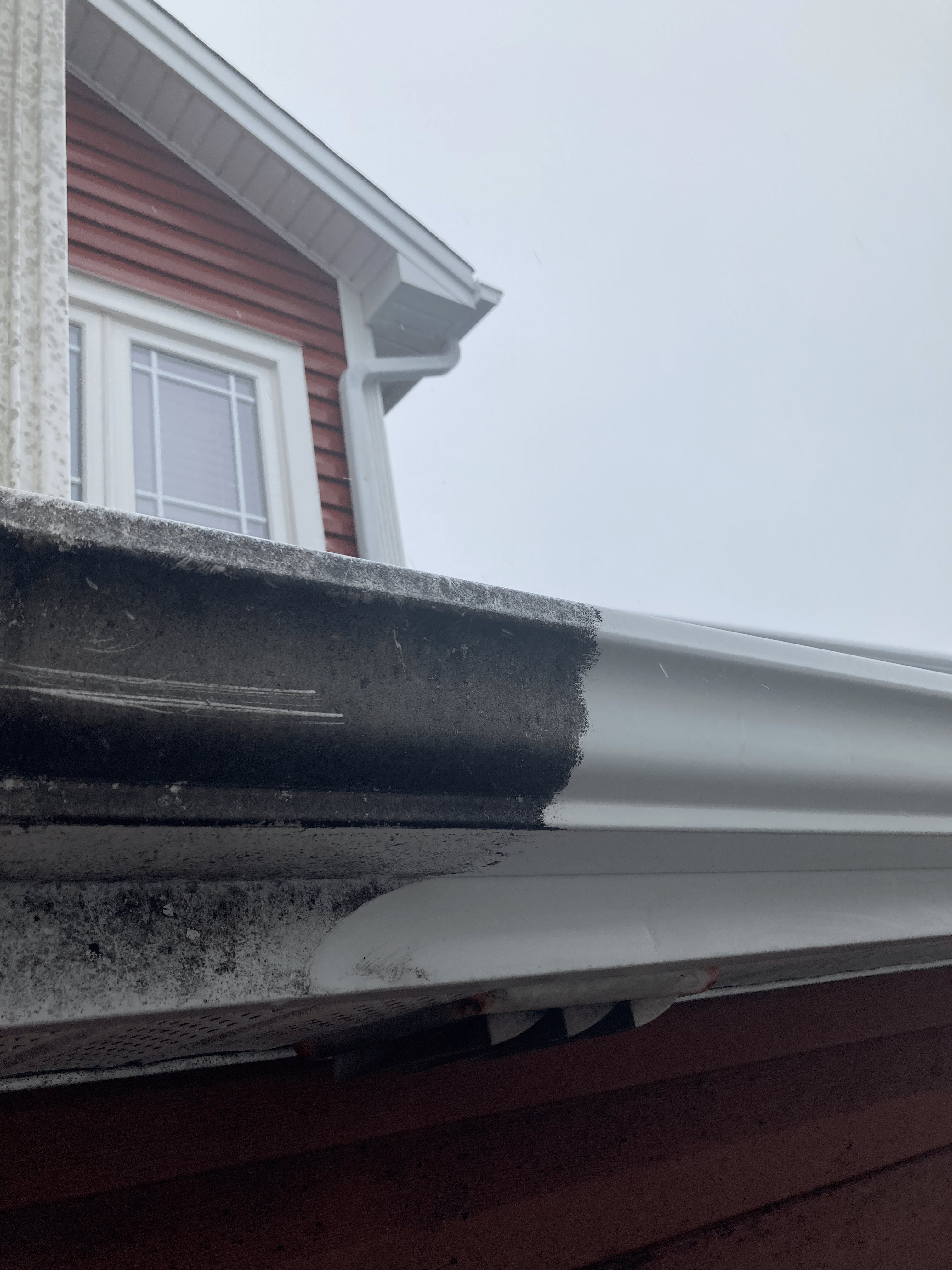 Extremely clogged gutter cleaned in St. John's